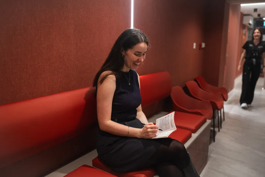 A patient relaxing in the Pearly Whites waiting area