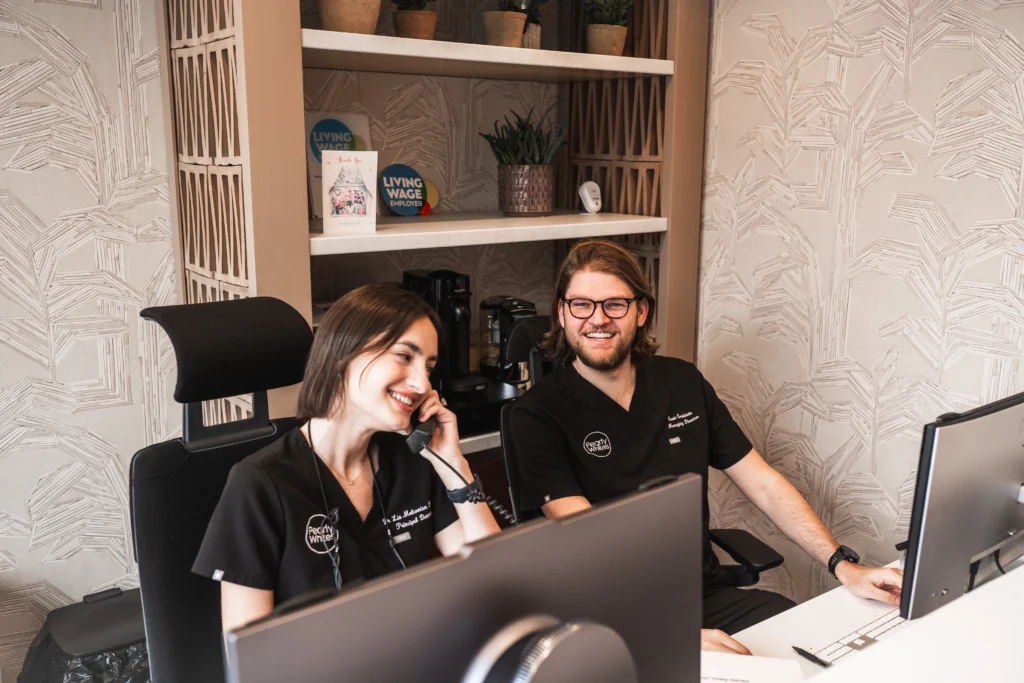 The Pearly Whites reception team on the phones